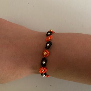 Orange and Black Beaded Flower Bracelet